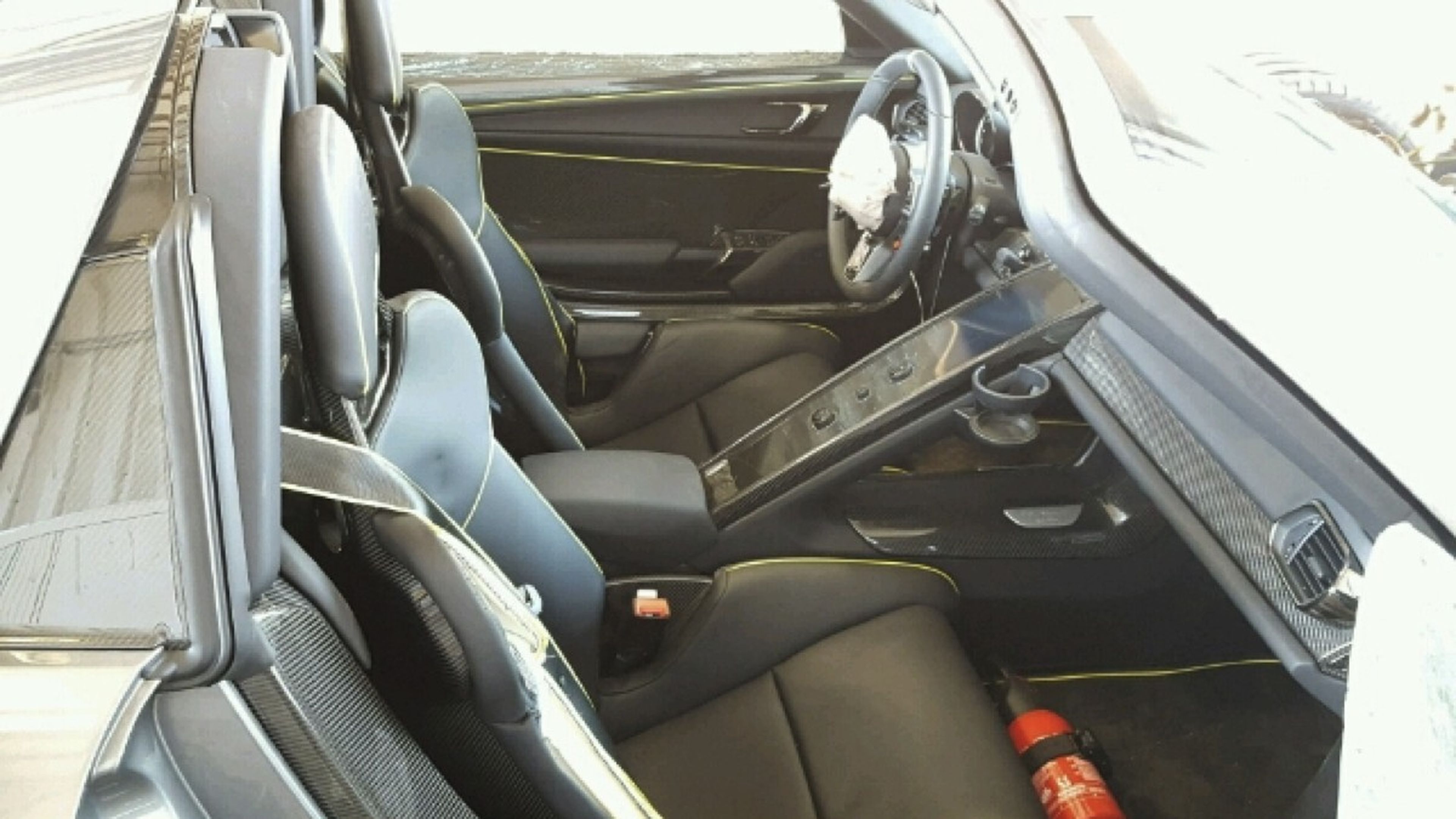 Porsche 918 Spyder accidentado asientos