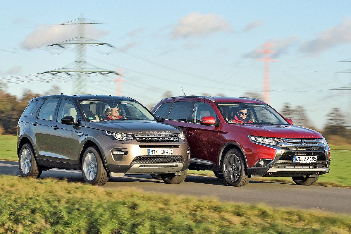 Сравнить митсубиси аутлендер. Ленд Ровер Аутлендер. Land Rover Discovery vs Discovery Sport. Ленд Ровер Аутлендер 2020. Мицубиси Дискавери спорт.