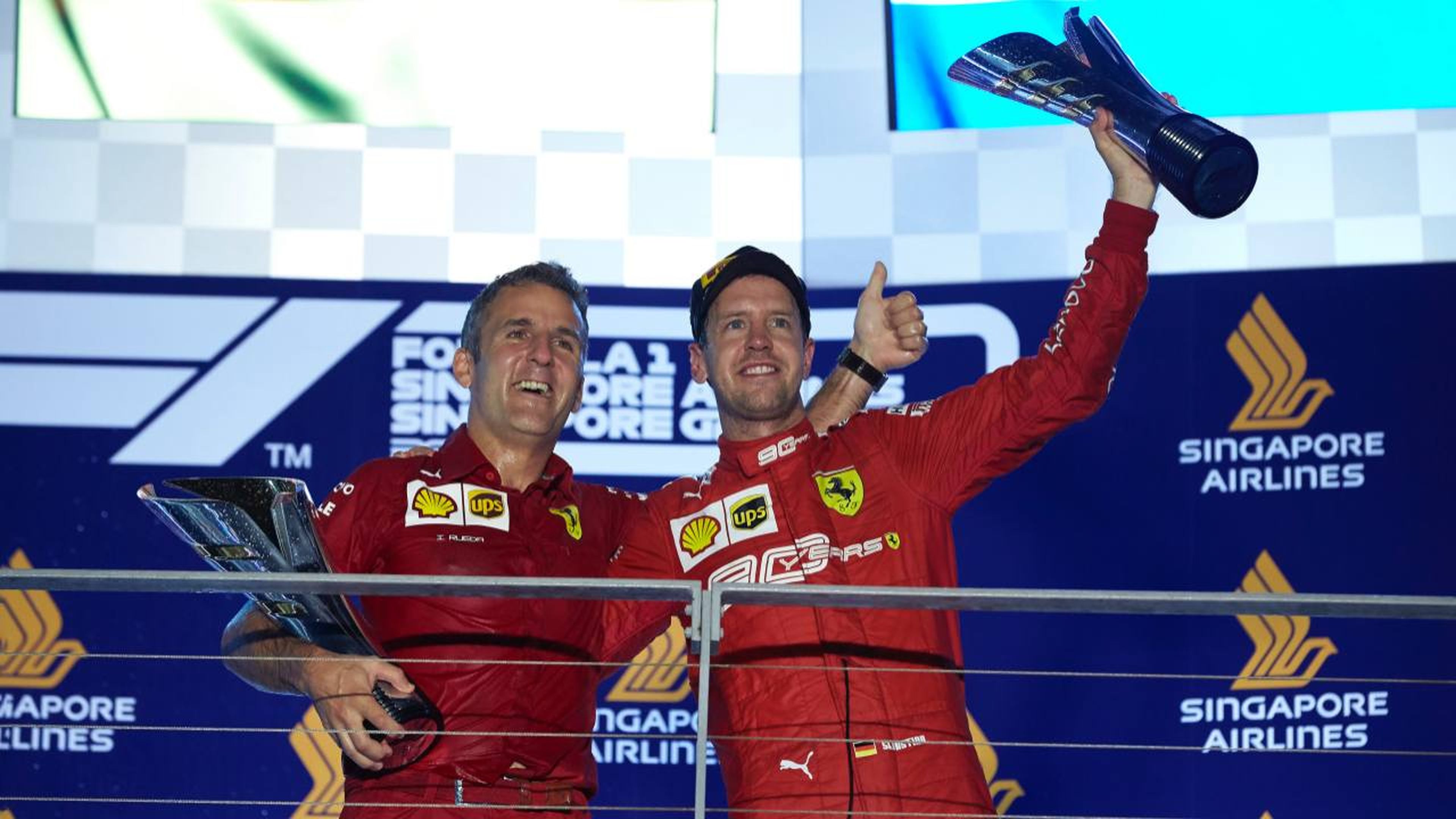 Iñaki Rueda y Sebastian Vettel