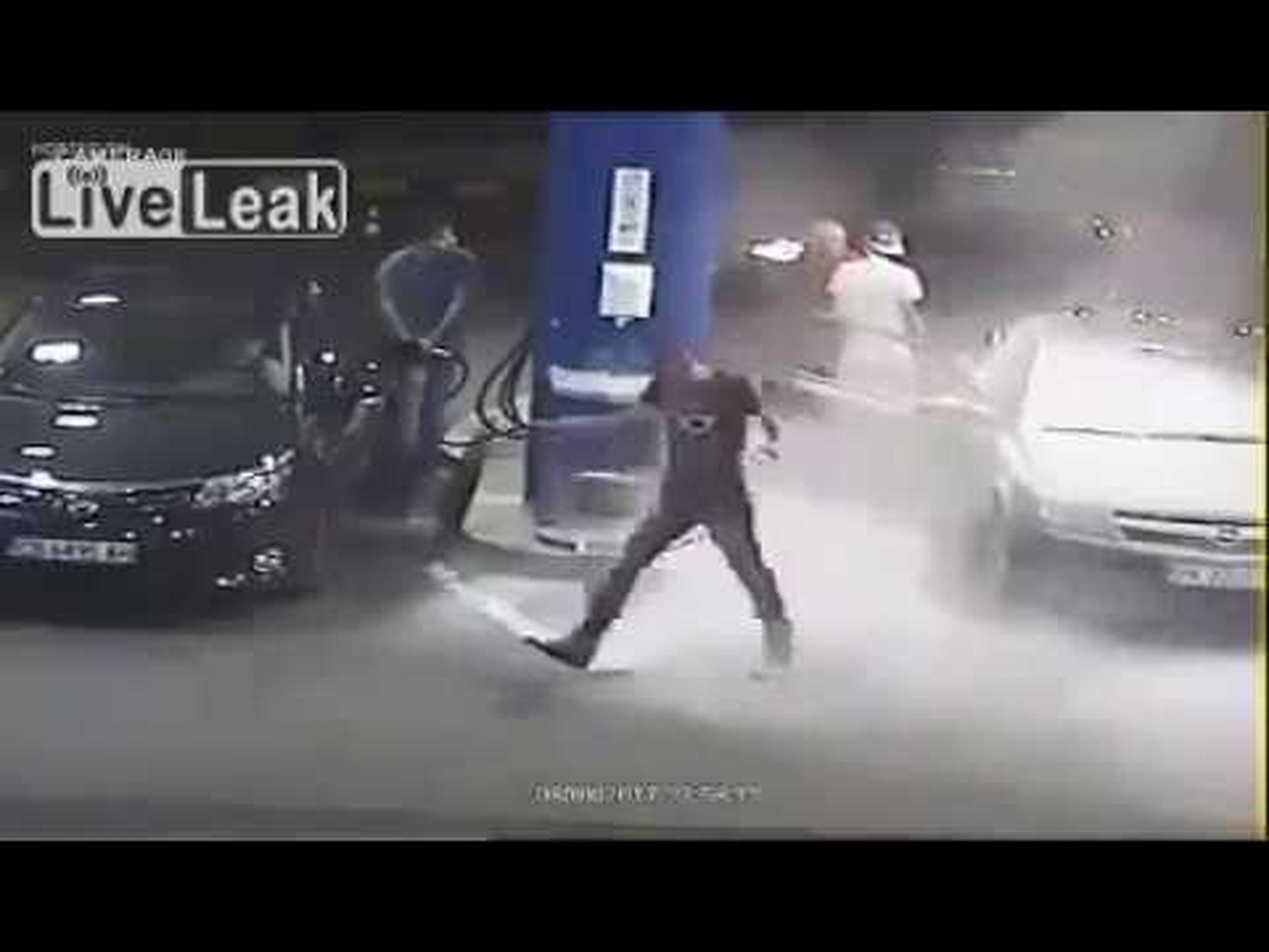 Gas station worker uses fire extinguisher on a smoking man ?