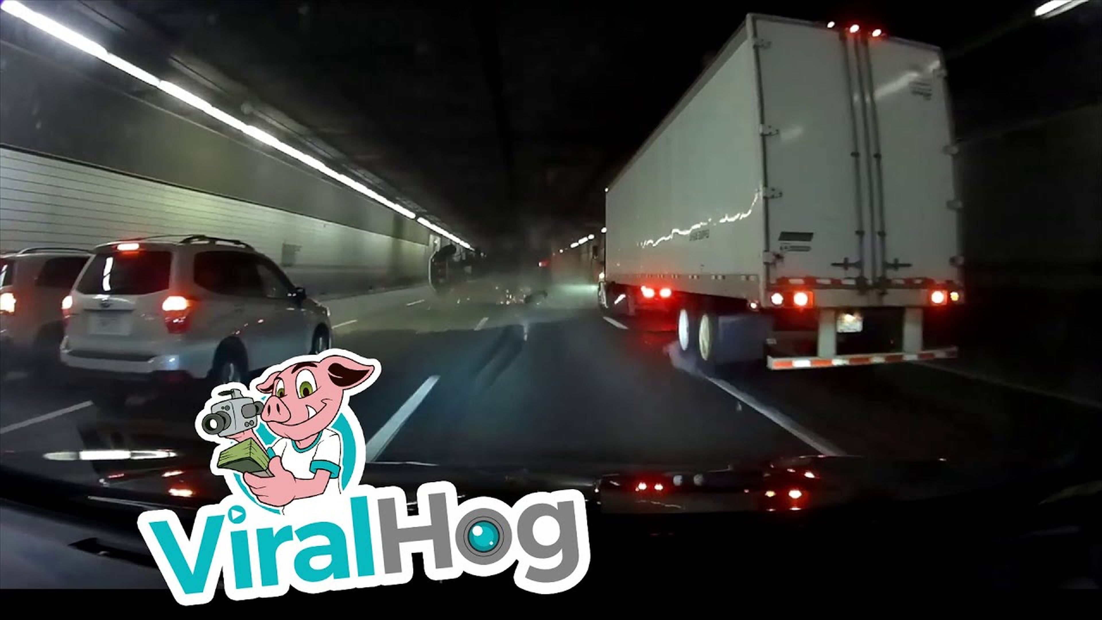 Truck Tips Over in Traffic Filled Tunnel || ViralHog