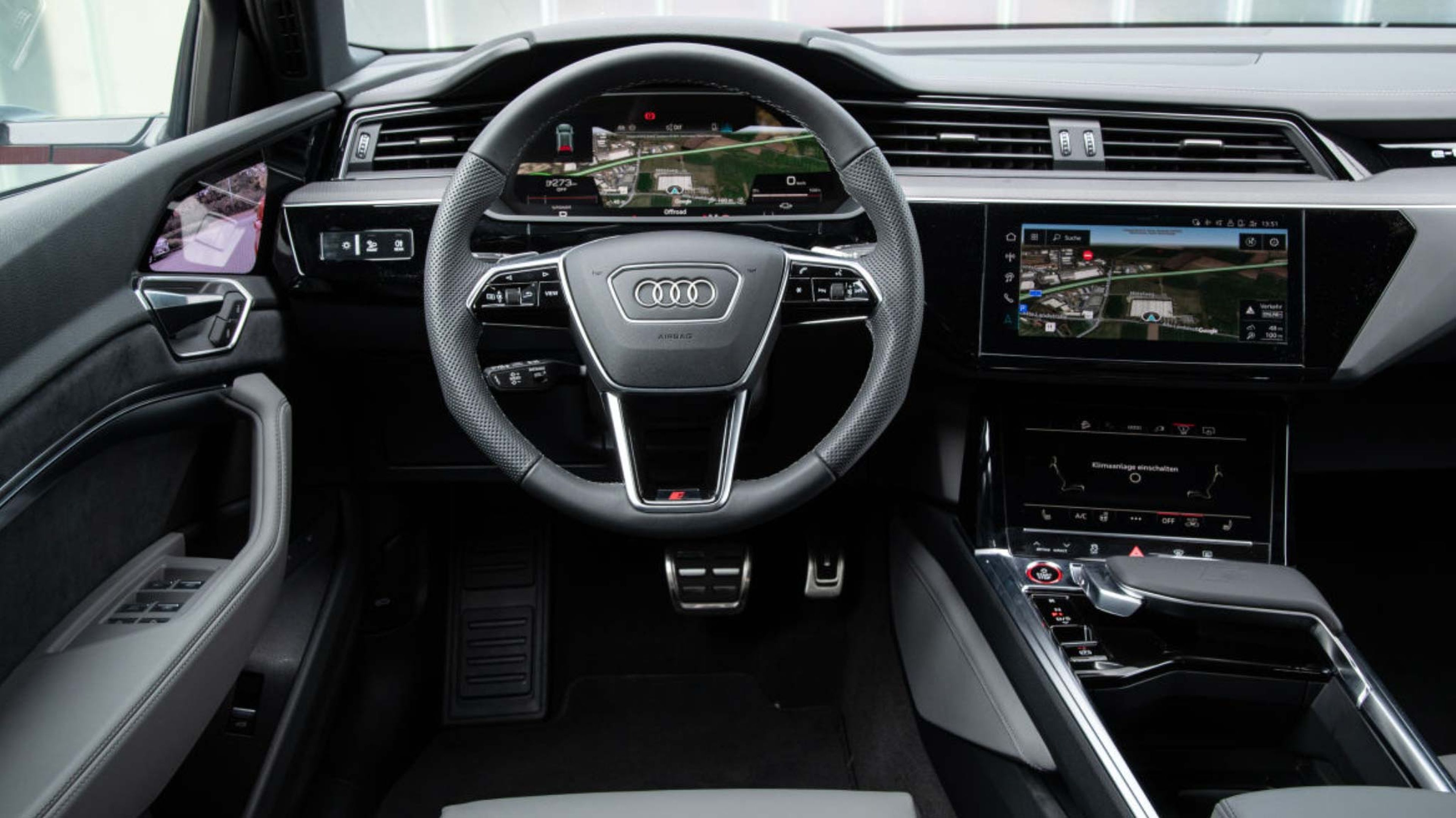 Audi SQ8 e-tron vs BMW iX xDrive50 cockpit 2