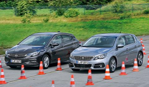 Opel Astra vs Peugeot 308 Opel Astra vs Peugeot 308